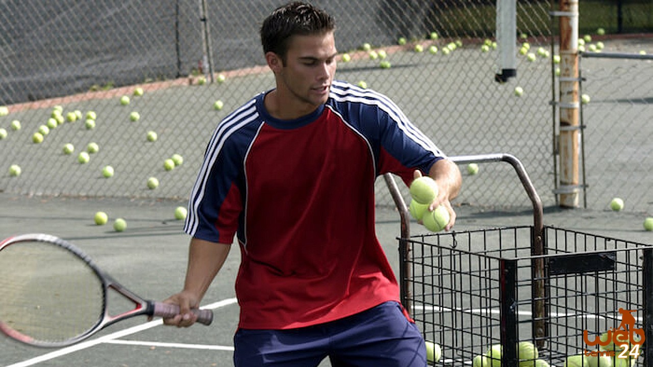 A Young Paddle Tennis Player Catching The Ball With The Racket